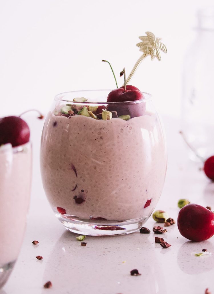 cherry chia pudding an easy breakfast recipe high in protein and high in fibre to make ahead the night before topped with fresh cherries, cacao nibs and pistachios