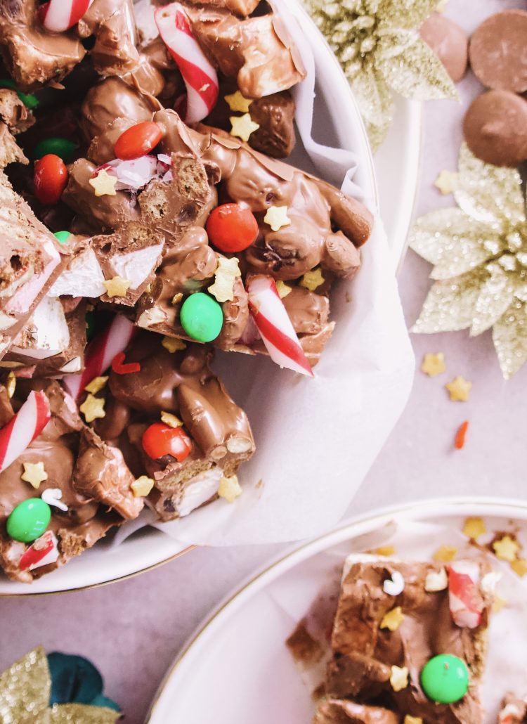 christmas rocky road recipe made with cadbury dairy milk chocolate easy to follow recipe with ginger nut biscuits displayed on a target white plate with gold rim